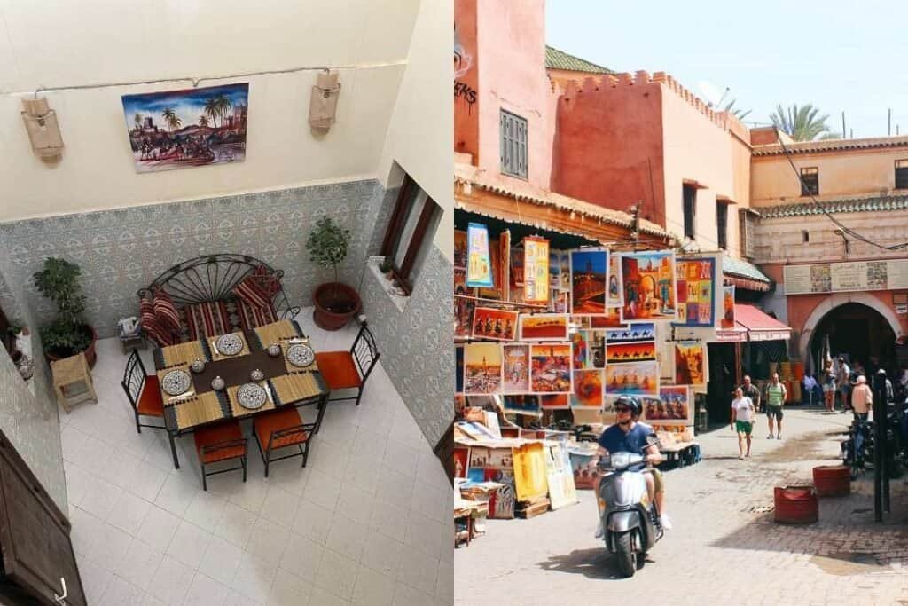 Cozy indoor courtyard dining area with traditional Moroccan decor at Barefoot Backpackers, featuring a dining table, colorful cushions, and potted plants.