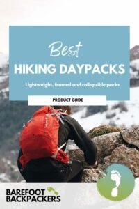 Comfortable hiker with a red backpack on rocky mountain terrain, promoting lightweight and collapsible hiking daypacks for outdoor adventures.