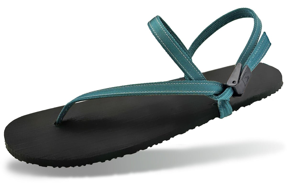 Earth Runners Primal barefoot sandal with a thin sole and laces.