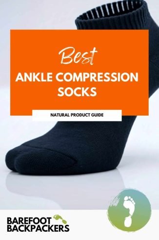 Soft black ankle compression sock on a white background, promoting comfort and recovery during mindful travel.