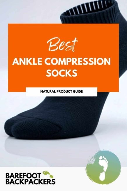 Soft black ankle compression sock on a white background, promoting comfort and recovery during mindful travel.