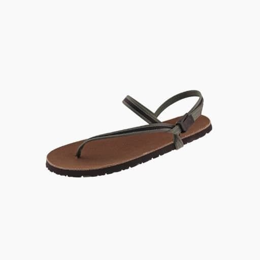 Comfortable barefoot-friendly brown flip-flop sandal with adjustable strap for travel and outdoor adventures. Ideal for backpackers seeking lightweight footwear.
