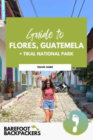 A woman exploring colorful streets in Flores, Guatemala, with vibrant buildings and cobblestone paths, promoting sustainable.