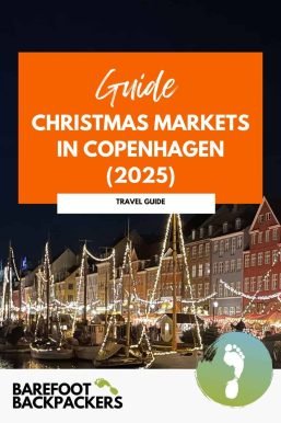 Beautiful night view of Christmas market in Copenhagen with colorful lights and cozy stalls by the harbor.