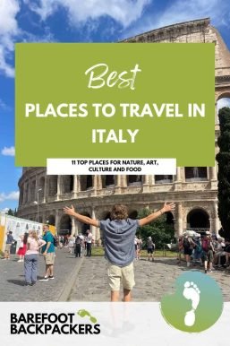 - Iconic Roman Colosseum with a person celebrating in front of it on a sunny day.