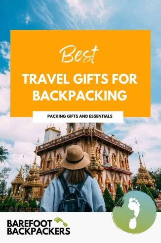 Comfortable traveler with backpack looking at ornate temple, promoting mindful, sustainable backpacking adventures.