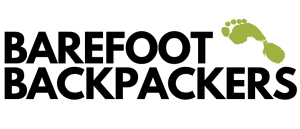 Barefoot Backpackers logo with green footprint icon, representing eco-friendly and adventurous travel experiences.